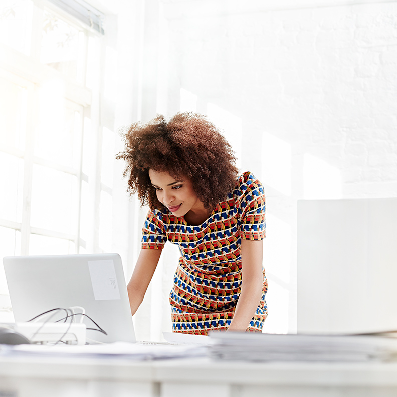 Woman Standing Desk Computer 792x792