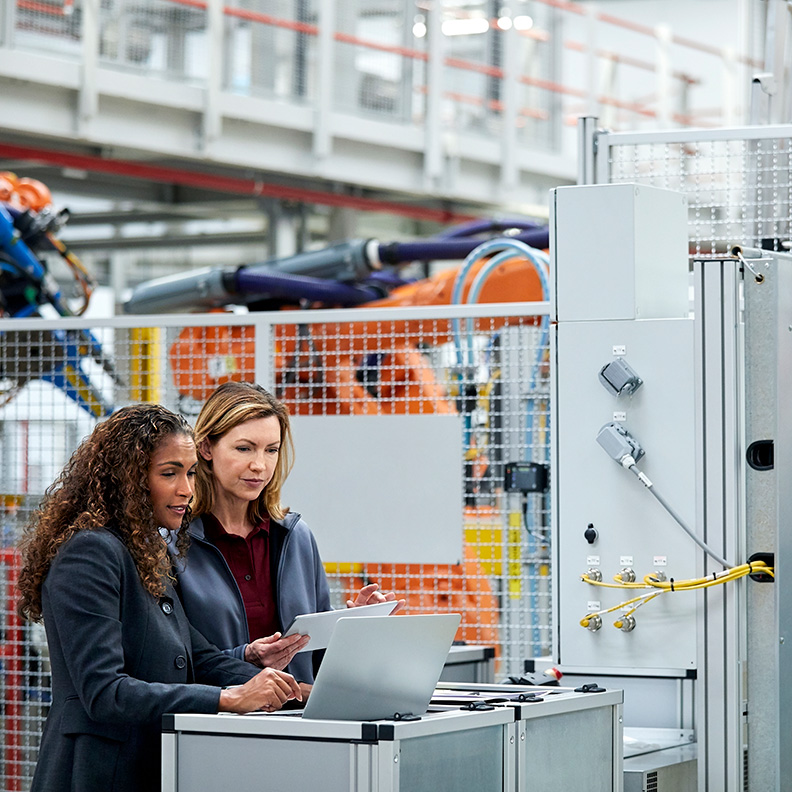 TwoWomen Computer ManufacturingPlant 792x792